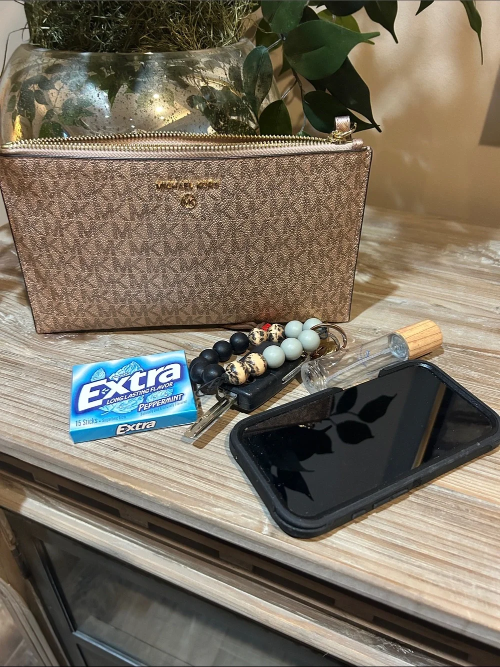 Michael Kors Metallic Rose Gold Signature Wristlet